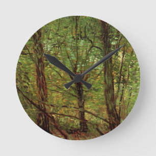 Bäume und Unterholz von Vincent van Gogh Runde Wanduhr