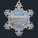 Beach at Ocean City, Maryland Schneeflocken Zinn-Ornament<br><div class="desc">Tide rolling onto the beach at Ocean City,  Maryland in autumn</div>