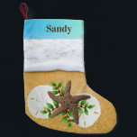 Beach Christmas Sand Dollars Double Sided Kleiner Weihnachtsstrumpf<br><div class="desc">Beach themed Christmas stocking to hang facing left or right, with design and name printed on both sides. Foamy surf and beach sand background with two big sand dollars and a starfish. Green holly leaves with red berries are tucked between the shells. Name is printed over a gradient blue-green strip...</div>
