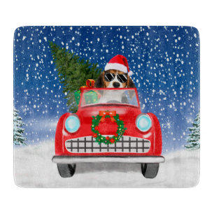 Beagle Hund fährt Auto im Schnee Weihnachten Schneidebrett