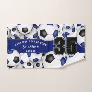 Beaucoup de balles de football noir bleu équipe co