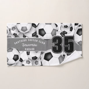 Beaucoup de ballons noirs gris de football couleur