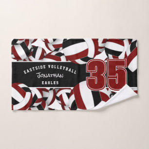 Beaucoup de volleyballs maroon noir couleurs d'équ
