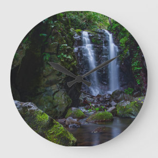 Beautiful waterfall in rainforest große wanduhr