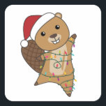 Beaver Cheerful Christmas Winter Animals Beavers Quadratischer Aufkleber<br><div class="desc">The beaver at Christmas with fairy lights. Funny animals with gifts and snow for the holidays. Also funny for Christmas in July. Beavers are cute animals and perfect for Christmas.</div>