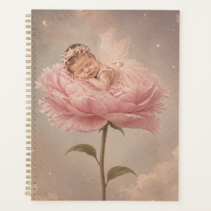 Bébé endormi fleur rose