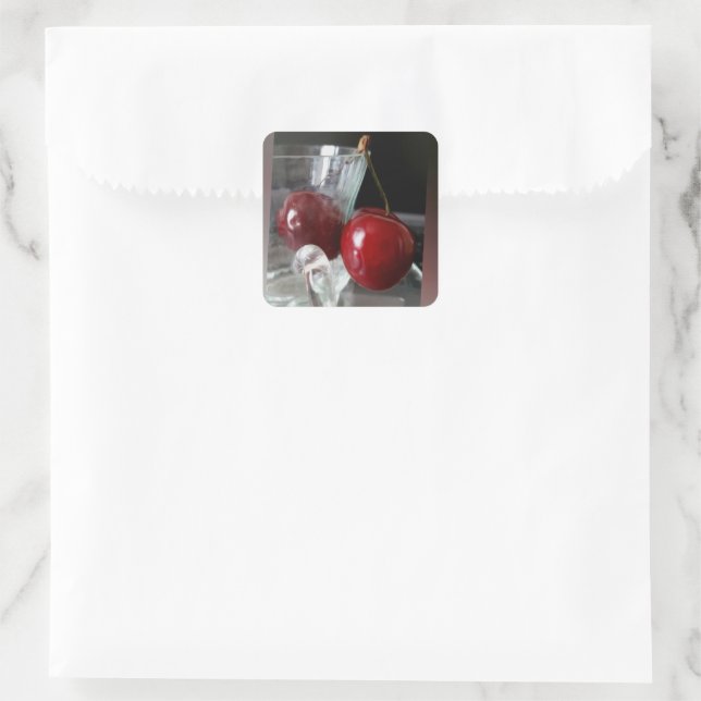 Becher mit Kirschen Quadratischer Aufkleber (Tasche)
