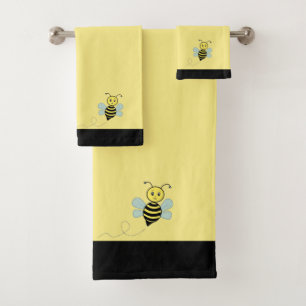 Bee de miel sur un ensemble de serviettes de bain 