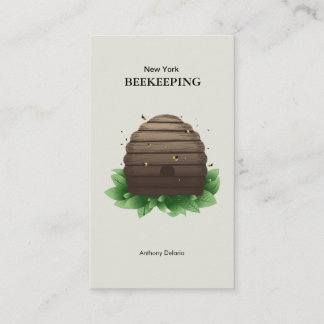 Beeehive u. Bienen auf grünem Blattbraun Visitenkarte