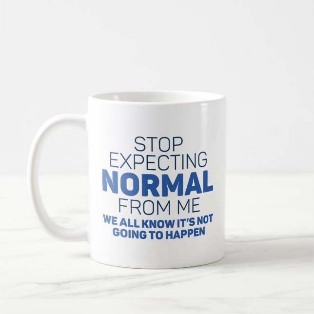Beenden Sie die Erwartung von normal von mir Kaffeetasse (Links)