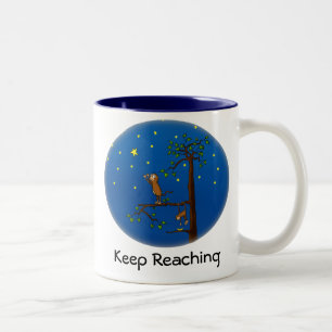 Behalt der Tasse des Affen