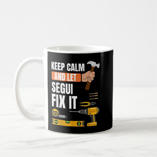 Behalt Ruhe und lass Segui fixx es handyman konstr Kaffeetasse (Links)