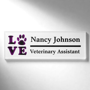 Behilflicher Namensveterinärumbau lila Pawprints Namenschild