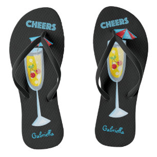 Beifall-Cocktail in Champagne-Glas drehen Flip Flops