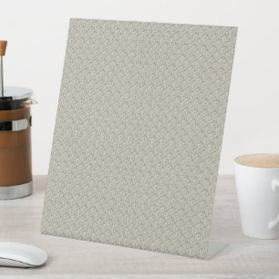 Beige Hintergrundfarbe mit kleinen Quadraten Sockelschild