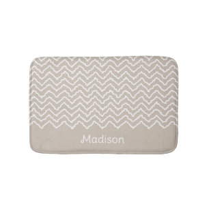Beige und weiße geschwungene Chevron-Zickzack-Must Badematte