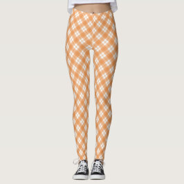 Beige und weiße karierte Leggings angezeigt