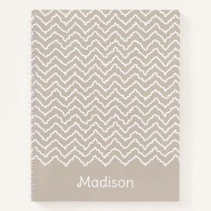 Beige-weiße geschwungene Chevron-Zickzack-Linie mi Notizbuch