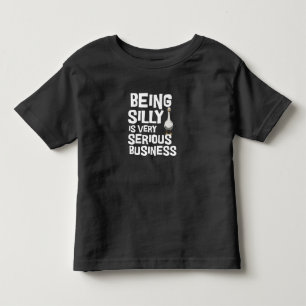 Bein Albern ist ein ernster Geschäftslustiger Kleinkind T-shirt
