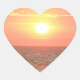 Bel autocollant de coeur de coucher du soleil