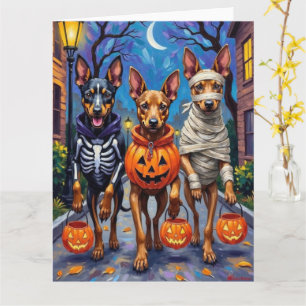 Belgische Malinois-Hunde beim Trick-or-Treaten an  Karte