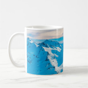 Berge mit Schneegipfeln und Sonnenuntergang Skynow Kaffeetasse