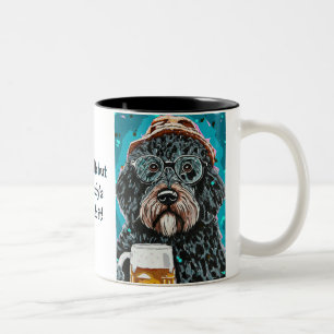 Bernedoodle mit einer Tasse