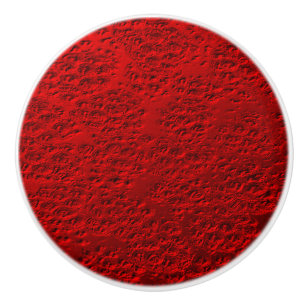 Beschädigtes rotes Metall Keramikknauf