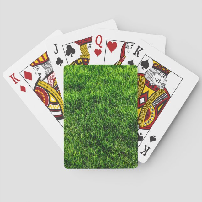 Beschaffenheit des grünen Grases von einem Spielkarten (Rückseite)