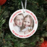 Best Aunt Uncle Ever Christmas Tree Foto Ornament<br><div class="desc">Give the best aunt and uncle ever a fun gift this holiday season with this custom foto white Christmas tree ornament with red text declaring "This Christmas Tree belongs to the Best Aunt & Uncle Ever." Easily personalize with a family fotograph. You can personalize "Best Aunt & Uncle Ever" to...</div>