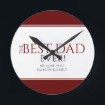Best Dad Ever Red Black Father`s Day Runde Wanduhr<br><div class="desc">Modern Best Dad Ever Red Black Father`s Day Clock. The design has modern typography in black and red colors and elegant dark red stripes. Personalize with your names. Great gift and keepsake for a dad or a grandfather for Father`s day or birthday.</div>