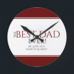 Best Dad Ever Red Black Father`s Day Runde Wanduhr<br><div class="desc">Modern Best Dad Ever Red Black Father`s Day Clock. The design has modern typography in black and red colors and elegant dark red stripes. Personalize with your names. Great gift and keepsake for a dad or a grandfather for Father`s day or birthday.</div>