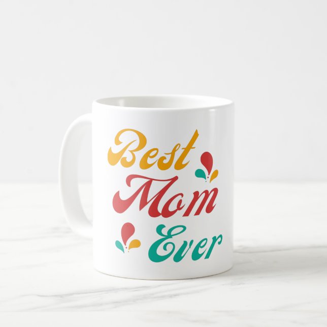 BESTE MAMA JE - MUTTERTAG KAFFEETASSE (Vorderseite Links)