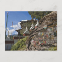 Bhutanese writing on rocks and Nepalese chortens