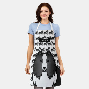 Bi-Schwarze Cartoon-Sheltie mit Hundeknochen und N Schürze