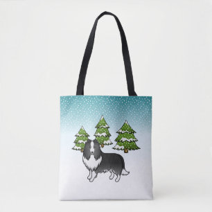 Bi-schwarzer Shetland-Schäferhund in einem Winterw Tasche