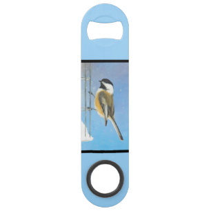 Bickadee sur la peinture d'alimentation - Oiseaux