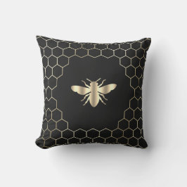 Bienenwabenhexagons auf schwarz kissen