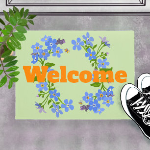 Bienvenue oubliez moi pas le tapis de porte floral
