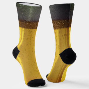 Bier-Tasse mit Bläschen und Schaumstoff Socken