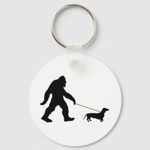 Big Foot läuft seinen Hund Schlüsselanhänger