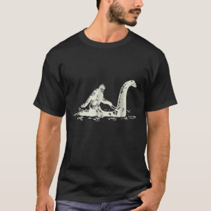Bigfoot Sasquatch Riding The Loch Ness Monster Fun T-Shirt