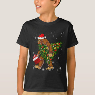 Bigfoot Tragend Weihnachtsbaum Sasquatch Glaube T-Shirt
