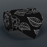 Black And White Leafy NeckTie Krawatte<br><div class="desc">Elevate your evening attire with this striking black necktie,  featuring a crisp white floral and leaf motif. The high-contrast botanical print offers a fresh,  modern take on traditional floral patterns,  making it a versatile piece for weddings,  galas,  or high-stakes boardroom meetings.</div>