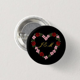 Black badge with a pink and red heart button