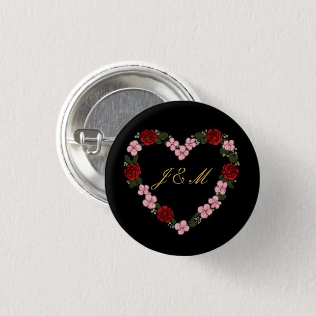 Black badge with a pink and red heart button (Vorne & Hinten)