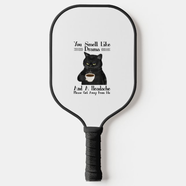 Black Cat-Kaffee riecht man wie Drama und ein Head Pickleball Schläger (Vorderseite)