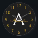 Black Gold Modern Script Girly Monogram Name Große Wanduhr<br><div class="desc">Black and Gold Simple Script Monogram Name Clock. This makes the perfect sweet 16 birthday,  wedding,  bridal shower,  anniversary,  baby shower or bachelorette party gift for someone that loves glam luxury and chic styles.</div>