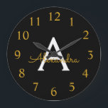 Black Gold Modern Script Girly Monogram Name Große Wanduhr<br><div class="desc">Black and Gold Simple Script Monogram Name Clock. This makes the perfect sweet 16 birthday,  wedding,  bridal shower,  anniversary,  baby shower or bachelorette party gift for someone that loves glam luxury and chic styles.</div>