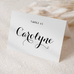 Black Modern Calligraphy Wedding Platzkarte Tischnummer<br><div class="desc">Erhöhen Sie Ihren Hochzeitsempfang mit unseren wunderschönen, individuell gestalteten Hochzeitsfeiern, die eine persönliche Touch zu Ihrem ganz besonderen Tag hinzufügen. Sie zeichnen sich durch moderne schwarze Kalligraphie und Herzakzent aus. Fügen Sie Ihren Gästen Namen, das Hochzeitsdatum oder eine besondere Nachricht hinzu. Verwandeln Sie Ihre Empfang-Tische in eine atemberaubende Darstellung von...</div>